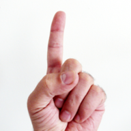 Sharah Kitab at-Tawheed app icon — a raised index finger, the gesture of tawheed